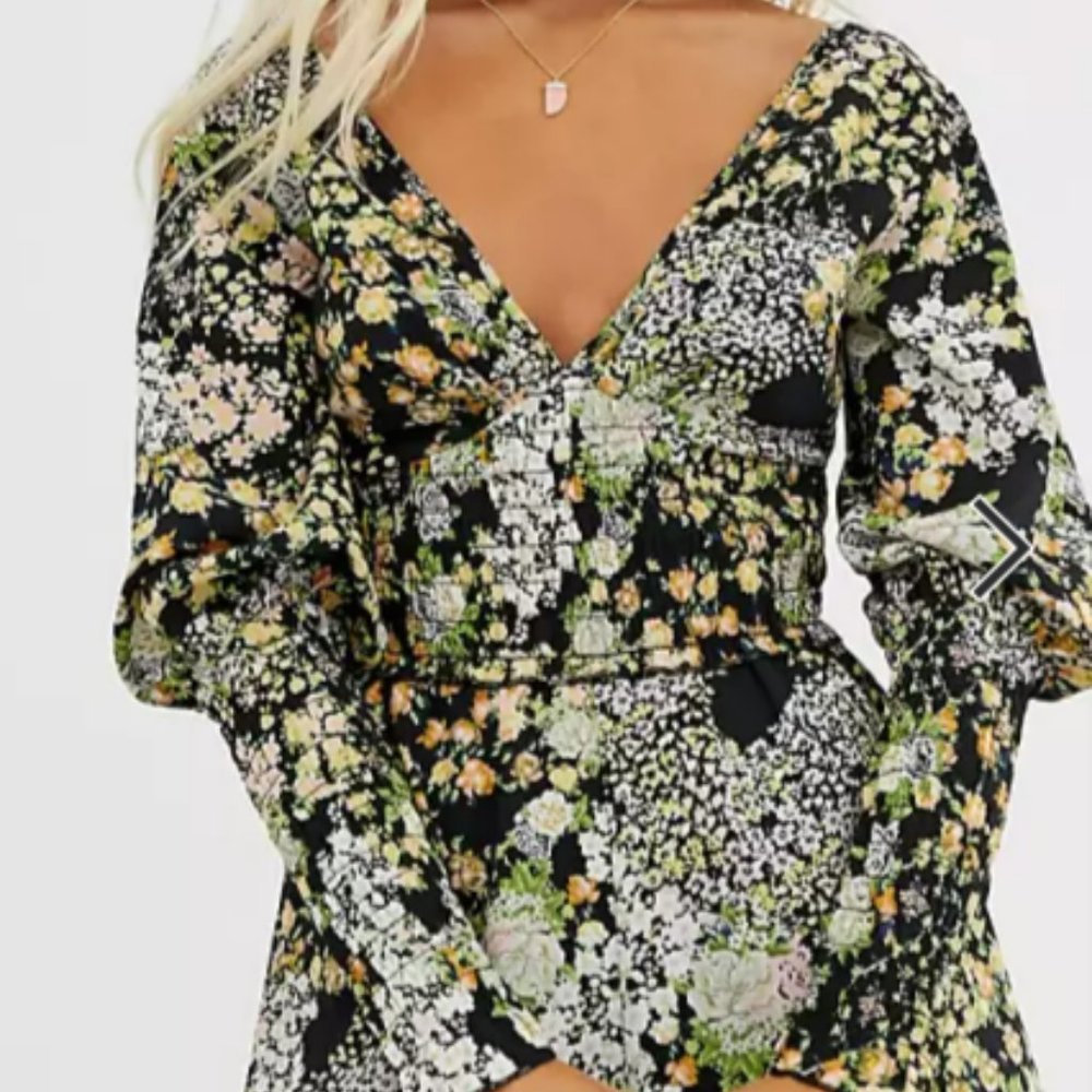 ASOS DESIGN Shirred Waist & Long sleeve V Neck Romper in Floral Print